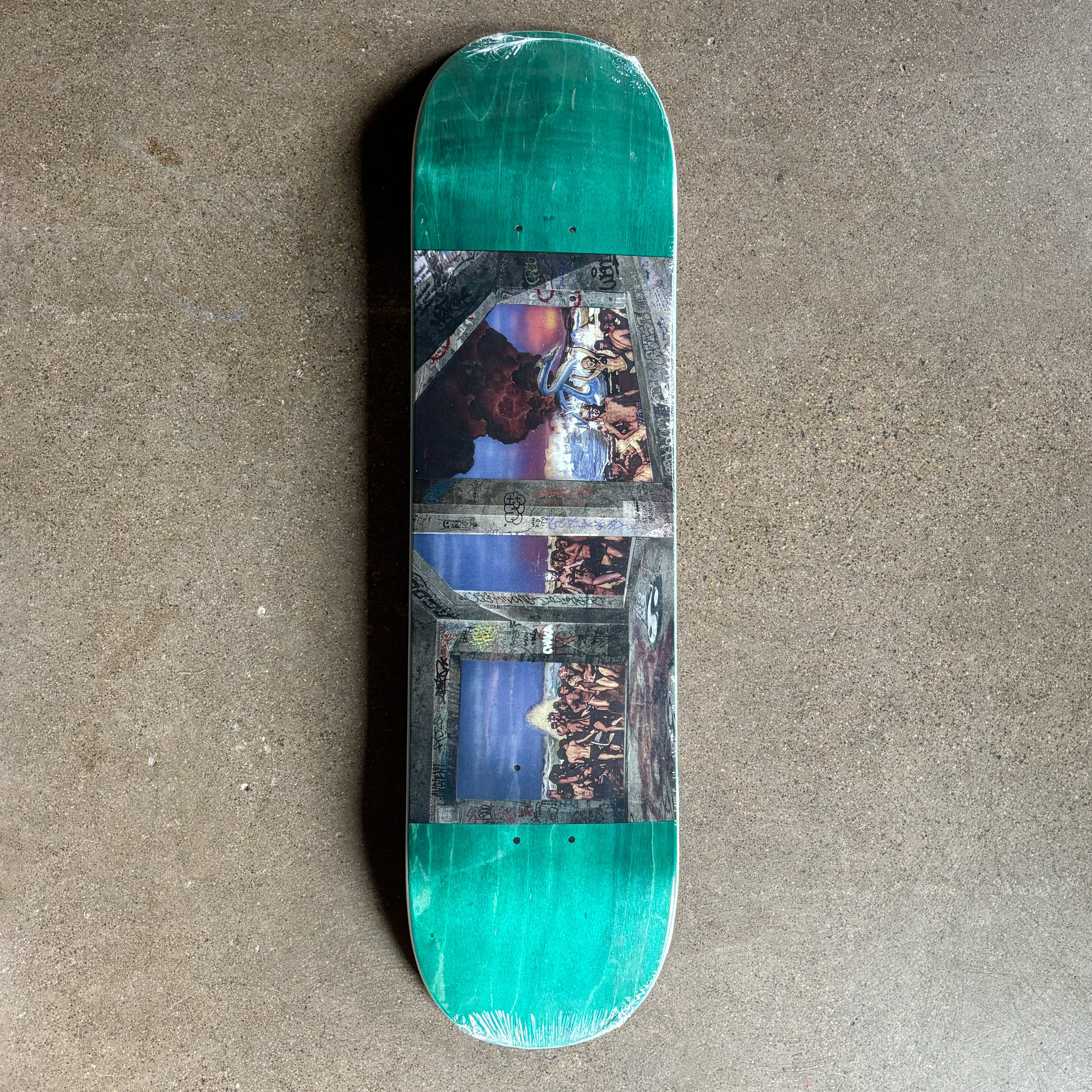 Full image of deck with collage artwork.
